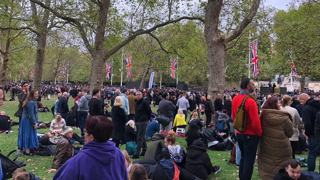 The Mall, UK: Crowds await at The Mall, London, before funeral proceedings get underway for Queen Elizabeth II. Picture: Supplied