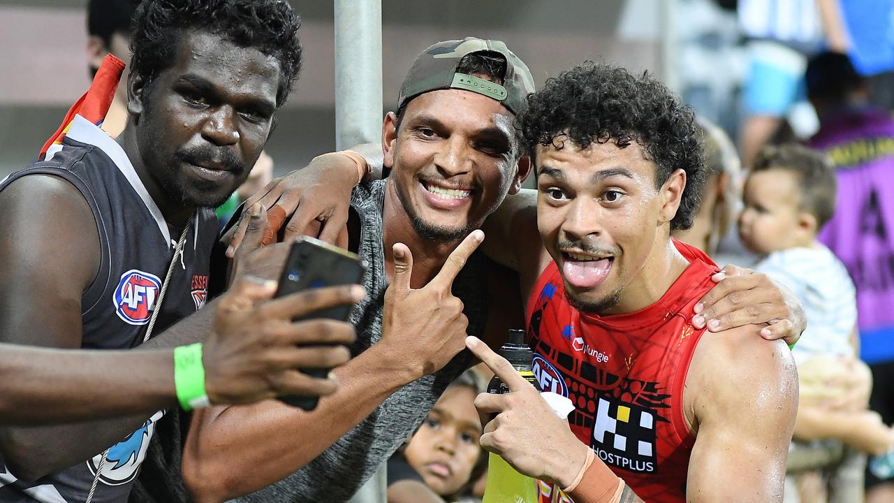 Malcolm Rosas with fans after his match against North Melbourne at TIO Stadium last year. (Photo by Felicity Elliott/AFL Photos via Getty Images)