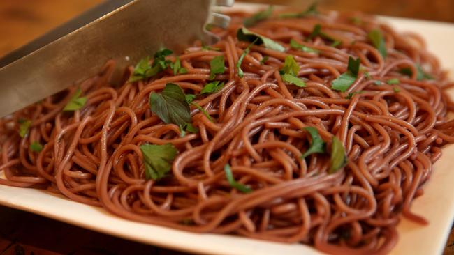 Pour on the praise: Sangiovese spaghetti is a prime example of using wine for cooking. Picture: Andy Rogers