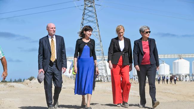 Australian Naval Infrastructure CEO Andrew Seaton, Susan Close, Katy Gallagher and Penny Wong at Snapper Point on the Port River. This will be the site of the new shipyard to build the AUSKUS submarines north of the ASC site. Picture: NCA NewsWire / Brenton Edwards