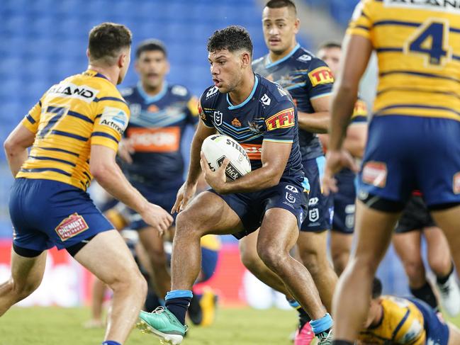 Brian Kelly playing in the NRL against Parramatta on the Gold Coast in March. He won't be able to play for the Titans when the competition restarts unless he has the flu injection. Photo Dave Hunt.