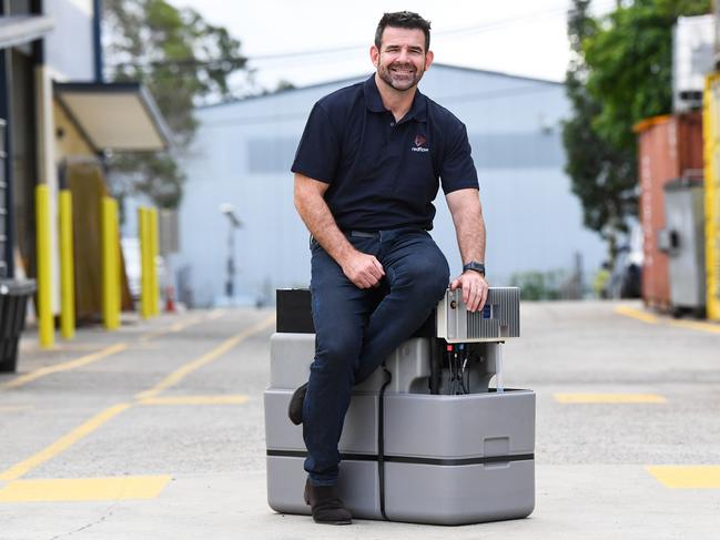 Redflow boss Tim Harris poses for a photograph in Brisbane, Friday, April 21, 2023. (AAP Image/Jono Searle) NO ARCHIVING