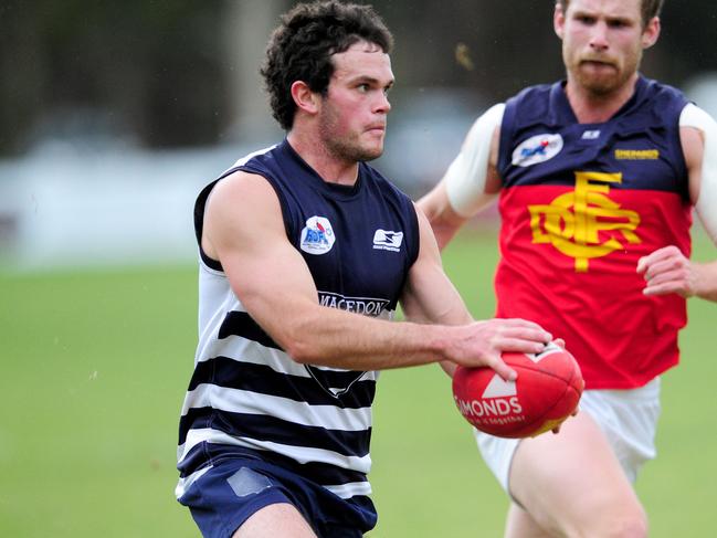 S47sr934 Riddell District Football League seniors match between Macedon and Diggers Rest at Tony Clarke Reserve, Macedon. Macedn's James Wright,1 with ball.