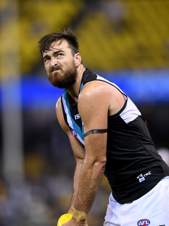 Port’s Charlie Dixon takes aim for goal  against the Kangaroos in the round 6.