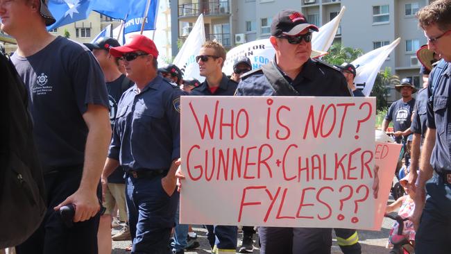 Fireys protested against the settlement between their chief executive Jamie Chalker and the NT government at the May Day march in Darwin on Monday. Picture: Annabel Bowles