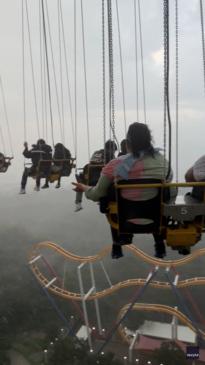 Terrifying moment riders stuck dangling during storm