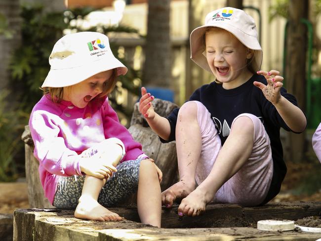 Excellent rating: Hannah 4, and Ivy, 5, have a laugh at KU Corrimal East Pre-school, near Wollongong. Picture: Justin Lloyd