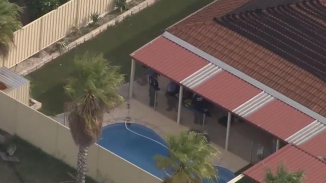 Police search a home in Perth's southern suburbs on March 15, 2021 believed to be linked to the killing of Rebels bikie boss Nick Martin. Picture: 9 News