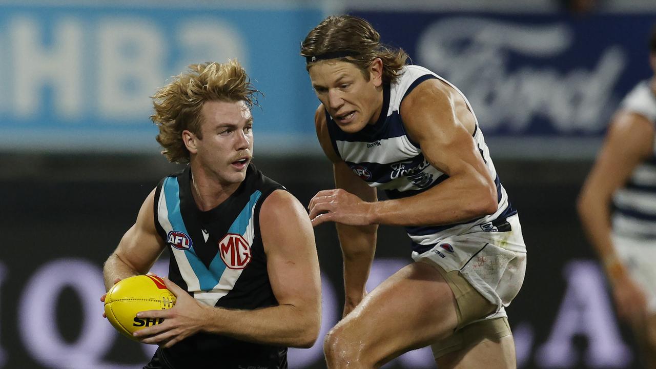 MELBOURNE , AUSTRALIA. May 5 , 2024.  AFL Round 10 . Geelong vs Port Adelaide at GMHBA Stadium.   Jason Horne-Francis of the Power clears out of the middle infront of Rhys Stanley of the Cats    . Pic: Michael Klein