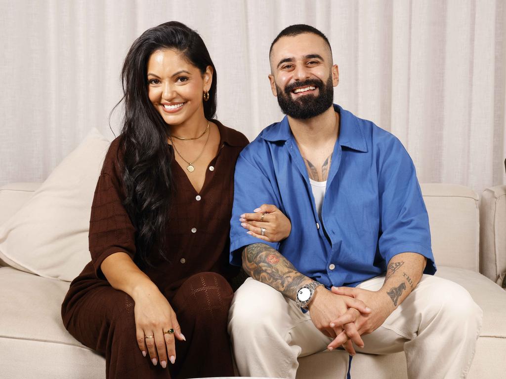 Sarah sits back on the couch alongside her husband Matty and his best friend Jad. Picture: Damian Shaw