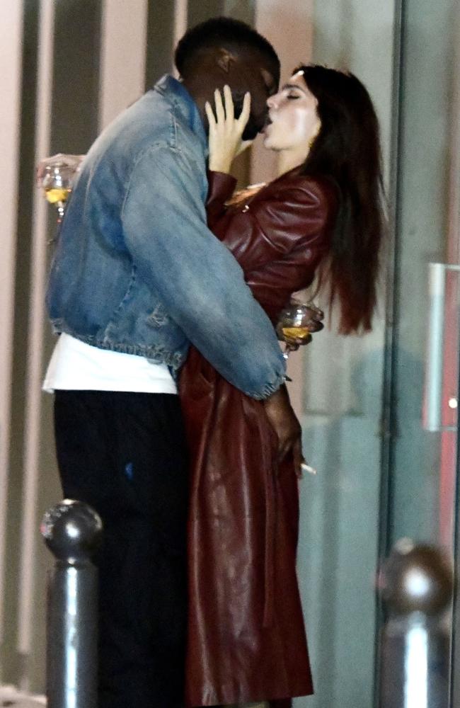 Emily Ratajkowski packs on the PDA with actor Stéphane Bak. Picture: Backgrid