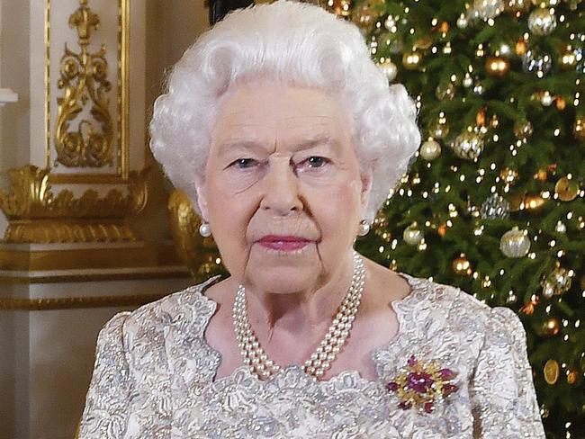 In this photo released on Monday, Dec. 24, 2018, Queen Elizabeth II poses after she recorded her annual Christmas Day message, in the White Drawing Room of Buckingham Palace in central London. (John Stillwell/Pool Photo via AP)