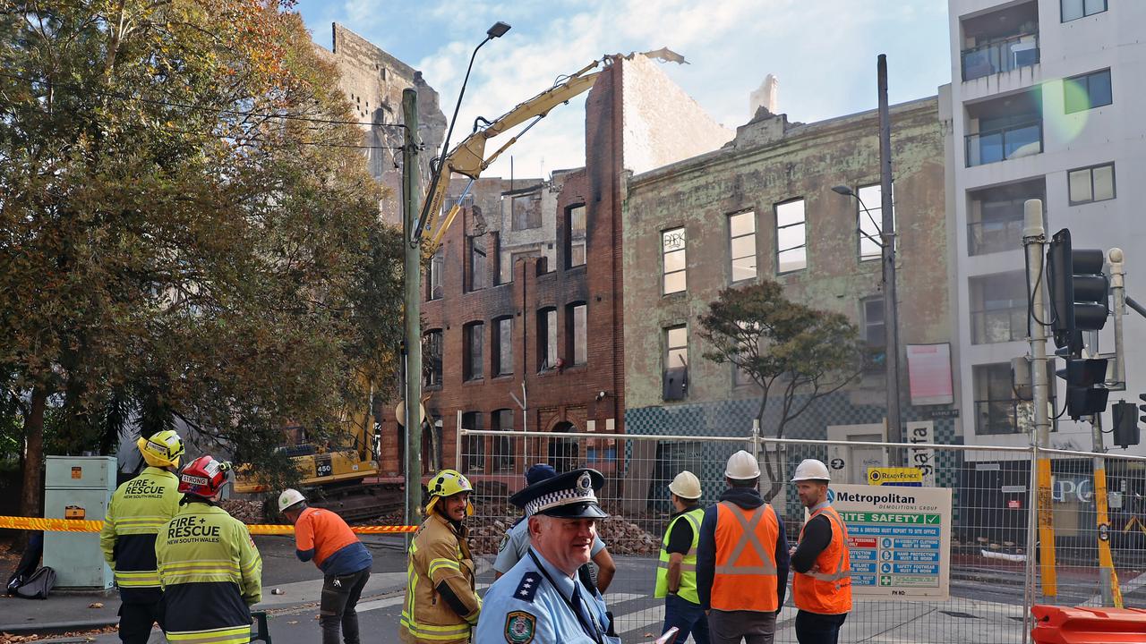 Emergency services as the demolition is underway. Picture: NCA NewsWire / Nicholas Eagar