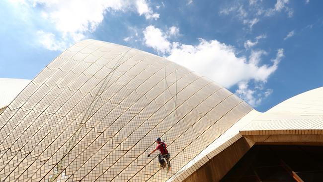 Building Operations staff inspect tiles on the Sydney Opera House sails on April 05, 2022 in Sydney, Australia. The 'tile tapping' test is conducted every five years to inspect the health of the tiles that cover the Sydney Opera Houses' iconic sails and takes six weeks to complete. (Photo by Mark Metcalfe/Getty Images)