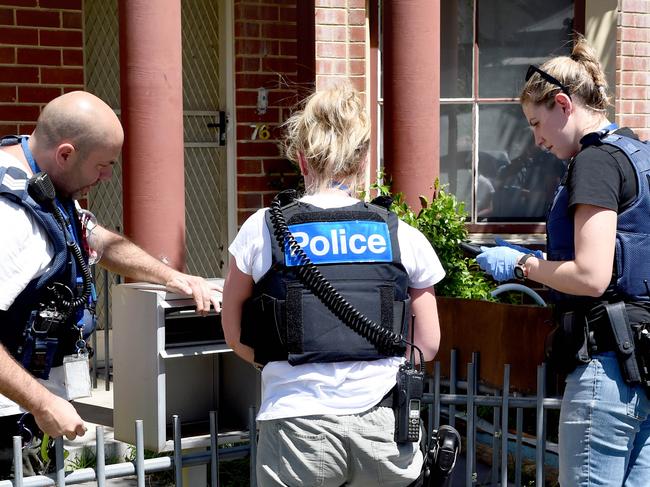 Police make 3 arrest at a suspected drug house in Egan St, Richmond.  Picture: Tony Gough