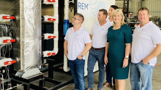 Renewable Energy Minister Eva Lawler inspects Aqua Aerem's mini hydrogen plant with its creators. Picture: Gary Shipway