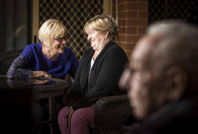 GETTING INVOLVED: Resident Colleen Thomas (right) tickled pink in conversation with volunteer Christine Garnett. Photos: Adam Hourigan Photography