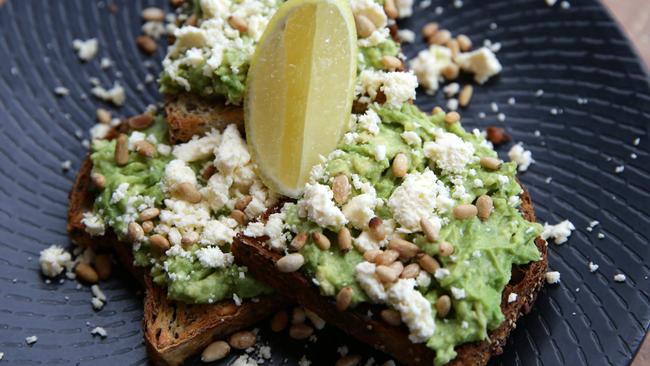 Calm Cafe’s smashed avocado on toast with fetta, pine nuts, pesto and lemon juice.