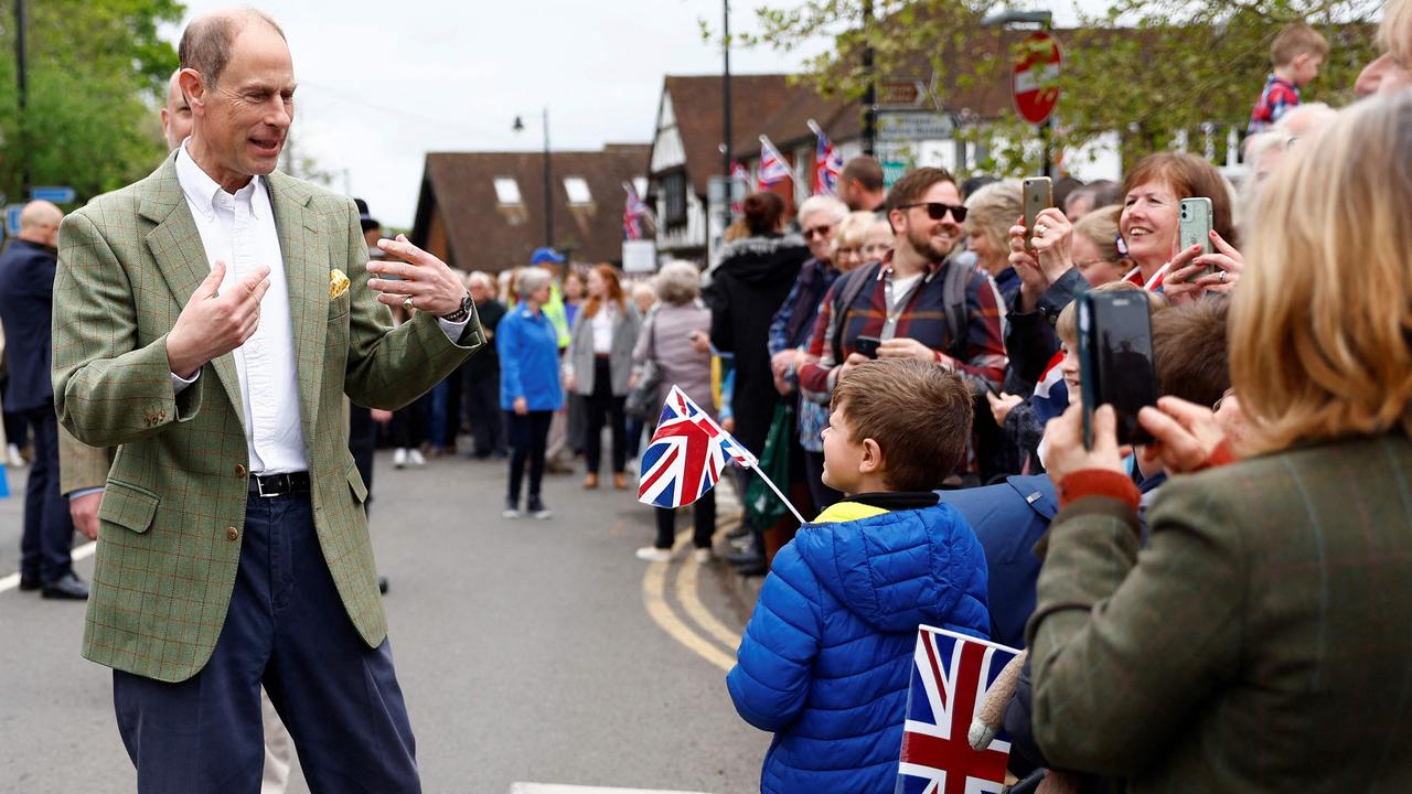 Britain's Prince Edward, Duke of Edinburgh meets members of the public as he leaves a Coronation Big Lunch. Picture: AFP