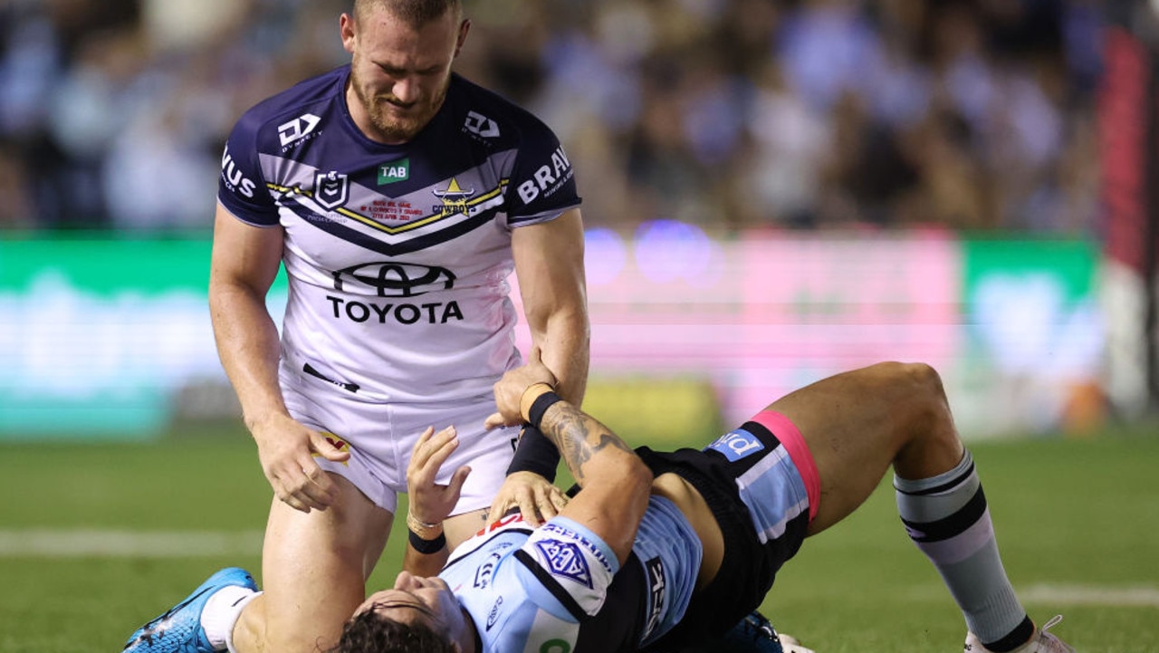 SYDNEY, AUSTRALIA - APRIL 27: Nicholas Hynes of the Sharks is tackled by Coen Hess of the Cowboys during the round nine NRL match between Cronulla Sharks and North Queensland Cowboys at PointsBet Stadium on April 27, 2023 in Sydney, Australia. (Photo by Cameron Spencer/Getty Images)