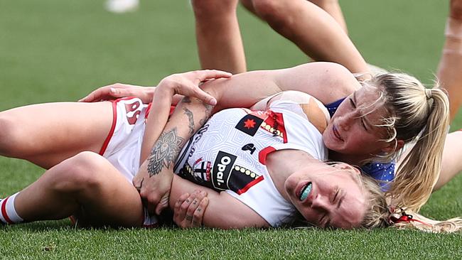 Tayla Harris slams Molly McDonald into the turf. Picture: Michael Klein