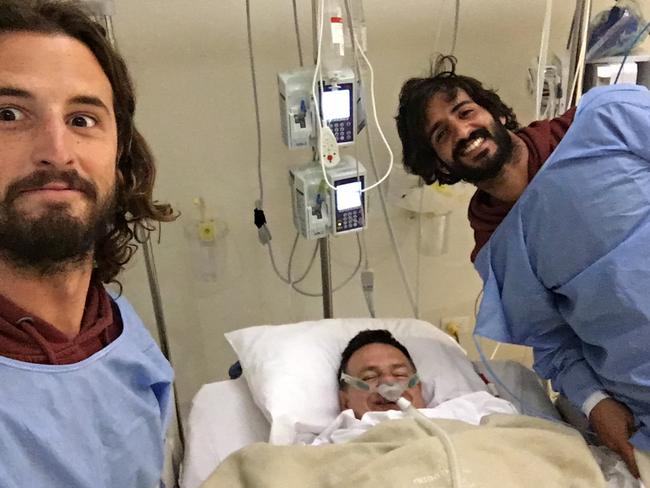 Philip Stephens still smiling despite a stint in intensive care for a heart issue — just five days before his epic trip to Machu Picchu. Pictured with Emiliano Bisson and Marcos Peluffo.