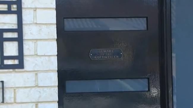 Ms Piil had a plaque which read: ‘Beware the rottweiler’ on her front door. Picture: 9News