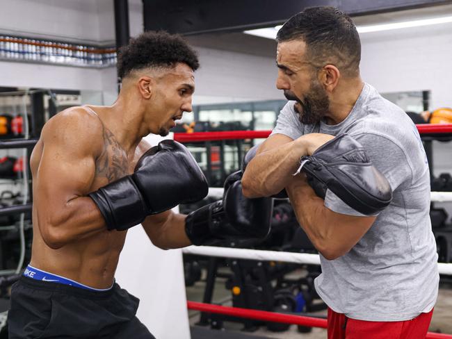 Padwork with coach Killa at his gym in Marrickville. Picture: Wanderer Promotions