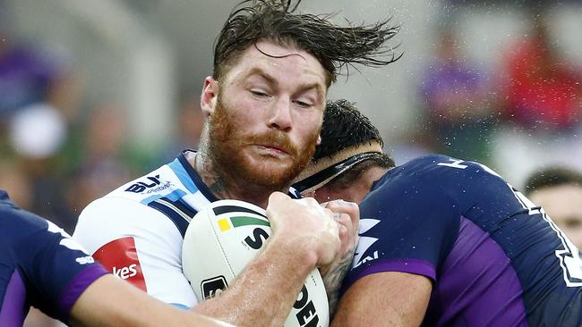 NRL - Melbourne Storm v Gold Coast Titans at AAMI Park , Chris McQueen gets tackled. 13th March 2016 Picture: Colleen Petch.