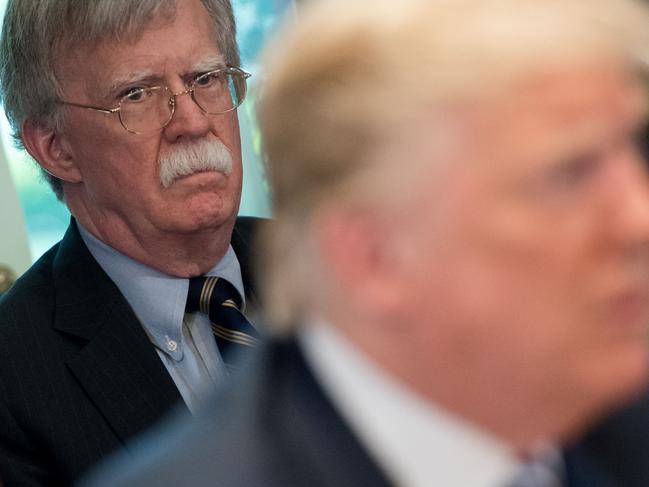 John Bolton and Mr Trump. Picture: AFP