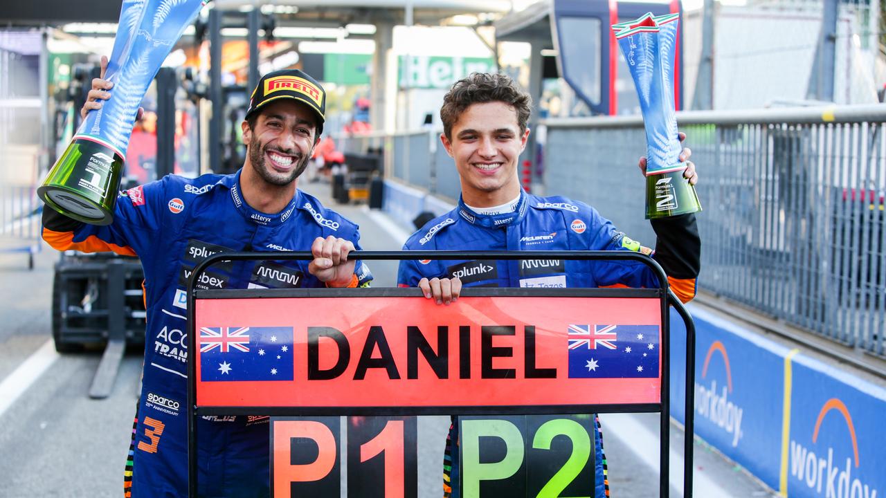 MONZA, ITALY - SEPTEMBER 12: Daniel Ricciardo of Australia and McLaren and Lando Norris of McLaren and Great Britain celebrate finishing 1-2 during the F1 Grand Prix of Italy at Autodromo di Monza on September 12, 2021 in Monza, Italy. (Photo by Peter Fox/Getty Images)