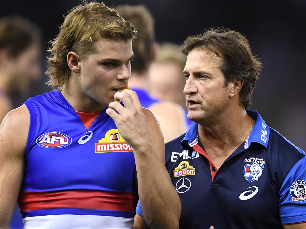 Luke Beveridge and Bailey Smith speak during a match. Picture: Getty Images