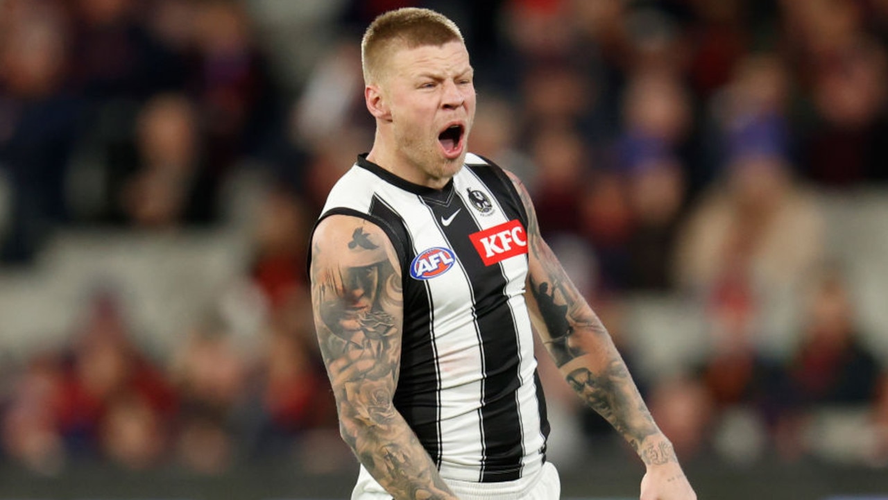 MELBOURNE, AUSTRALIA - AUGUST 05: Jordan De Goey of the Magpies celebrates a goal during the 2022 AFL Round 21 match between the Melbourne Demons and the Collingwood Magpies at the Melbourne Cricket Ground on August 5, 2022 in Melbourne, Australia. (Photo by Michael Willson/AFL Photos via Getty Images)