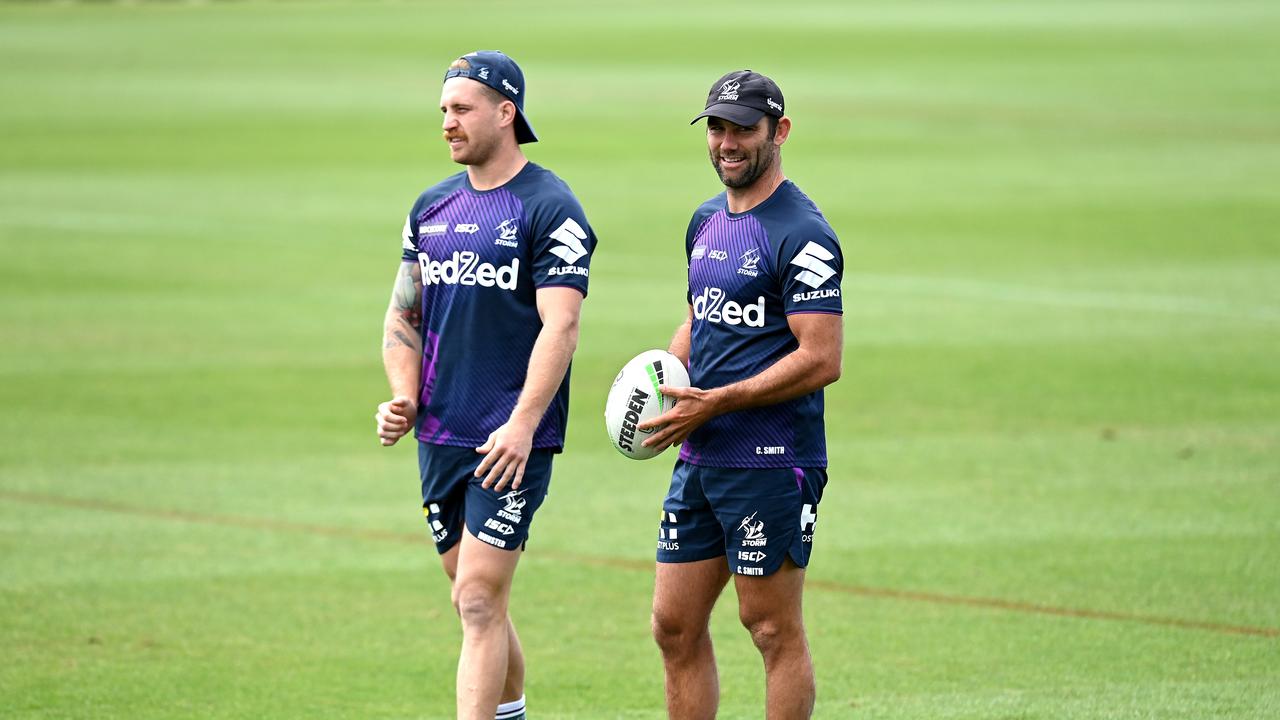 SUNSHINE COAST, AUSTRALIA - SEPTEMBER 29: Cameron Smith and Cameron Munster are seen chatting during a Melbourne Storm NRL training session at Sunshine Coast Stadium on September 29, 2020 in Sunshine Coast, Australia. (Photo by Bradley Kanaris/Getty Images)