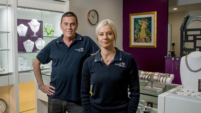 Robert Hain, owner of Darje by Roberts Jewellers in Broadbeach, with Tarra Jensen at his store. Picture: Jerad Williams.