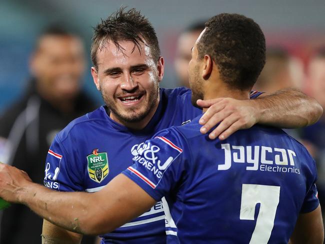 Josh Reynolds and Moses Mbye can guide the Bulldogs through their tough run home. Pic Brett Costello