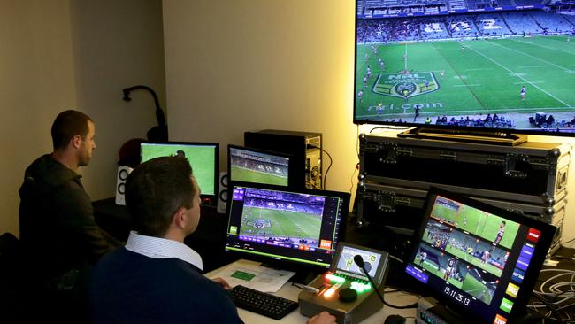 Patten (left) and Bernard Sutton in the NRL’s referee bunker. Picture: Gregg Porteous.