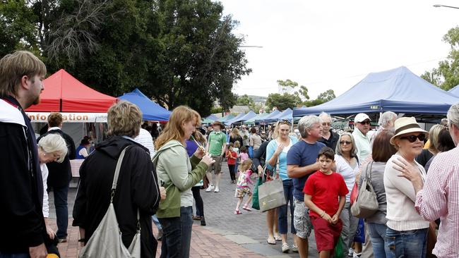 A busy Willunga Farmers Market before it was moved to the Willunga High School grounds. Picture: File