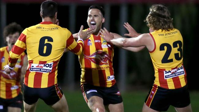 Edward Doak celebrates a Morphettville Park goal in last year’s finals. The club went on to win the division four flag. Picture: Dean Martin