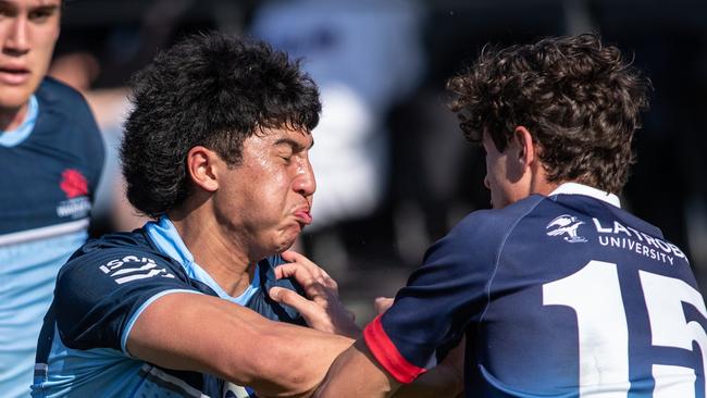 20th September 2022. News Local. SportDaceyville, Sydney, NSW, Australia.Pics by Julian Andrews.Rugby Union Action from the NSW Waratahs Under 18 team v Melbourne Rebels.Picture shows:WaratahÃs player(s): Ronan Leahy on his way to scoring try by beatingRebels player(s): Hugo Peel