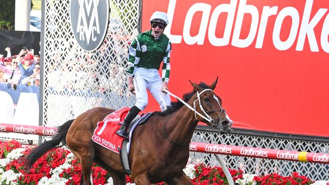 James McDonald stands in the irons after winning the Cox Plate aboard Via Sistina. Picture: Pat Scala/Racing Photos via Getty Images