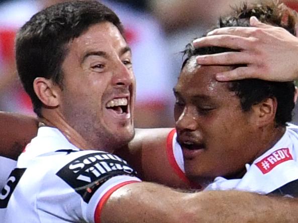 Luciano Leilua (right) of the Dragons celebrates scoring a try with Ben Hunt (left) during the Elimination Final between the Brisbane Broncos and the St George-Illawarra Dragons in Week 1 of the NRL Finals Series at Suncorp Stadium in Brisbane, Sunday, September 9, 2018. (AAP Image/Darren England) NO ARCHIVING, EDITORIAL USE ONLY