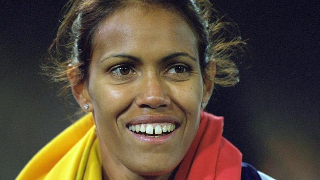 Cathy Freeman celebrates winning Gold in the Womens 400m Final at the Olympic Stadium on Day Ten of the Sydney 2000 Olympic Games in Sydney. (Picture: Nick Wilson/Allsport)