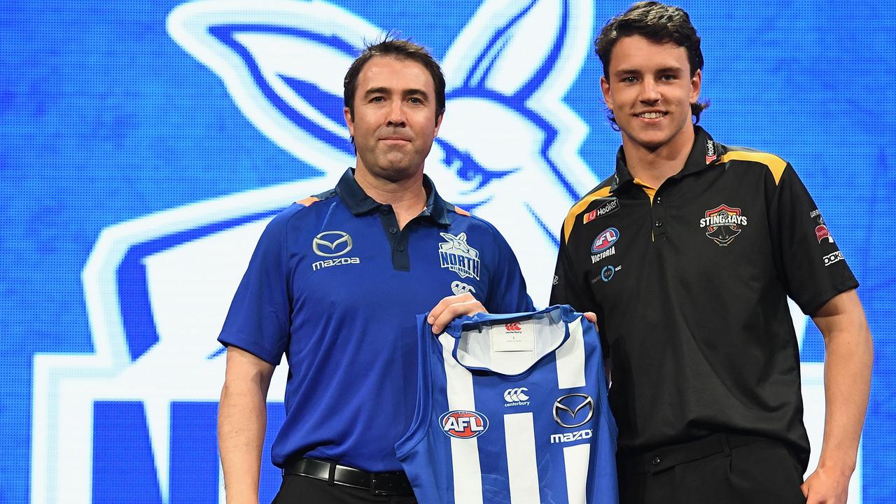 Brad Scott with Luke Davies-Uniacke. Picture: Getty Images