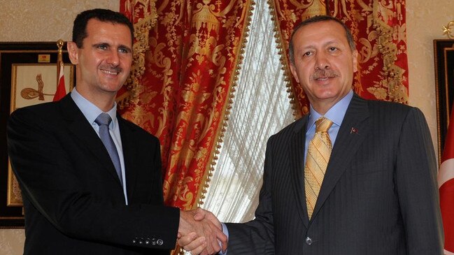 Syrian President Bashar al-Assad and Turkish President Recep Tayyip Erdogan in 2009. They are taking cautious steps towards re-establishing the ties they shared in the early years of their rules. Picture: AFP