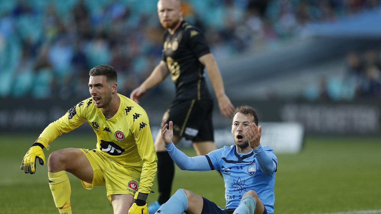 Sydney’s Adam Le Fondre and Wanderers player Daniel Margush in the last derby.