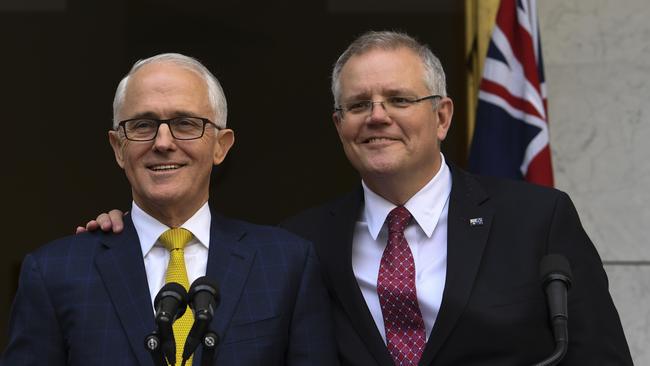 Then- Australian Prime Minister Malcolm Turnbull and then-Treasurer Scott Morrison speak to the media during a press conference eafter Turnbull narrowly survived a move to unseat him by his populist Home Affairs Minister Peter Dutton on August 21, 2018. Picture: Lukas Coch