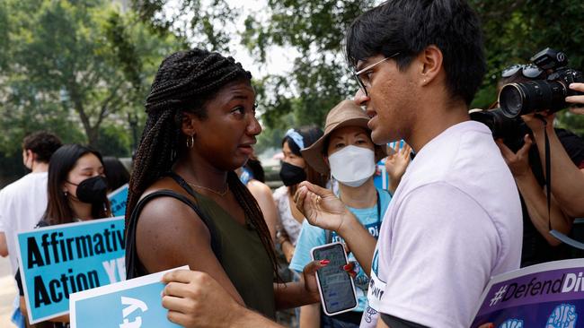 Harvard students Nahla Owens (L) and Kashish Bastola (R) become emotional in reaction to the news of Supreme Court’s decision. Picture: Getty Images via AFP.