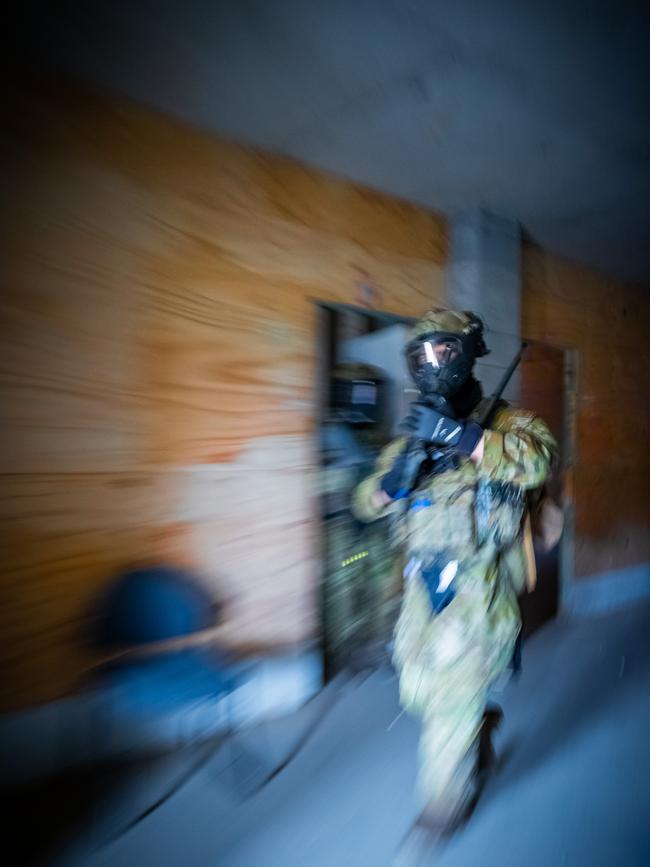 An Australian army soldier from the 3rd Battalion, Royal Australian Regiment, conducts building clearance during an urban assault serial using the Blue Bolt non-lethal training ammunition, as part of the 2022 Duke of Gloucester Cup in Singleton. *** Local Caption *** Australian Army infantry soldiers from across Australia tested their core skills for the prestigious Duke of Gloucester Cup at the School of Infantry, near Singleton in NSW, July 31 - August 5 2022. The Duke of Gloucester Cup is the Armyâ€™s premier military skills competition, pitting the best Royal Australian Corps of Infantry rifle sections from each unit against one another through a series of challenging activities that test their core infantry skills, including marksmanship, tactics, teamwork and fitness. Along with the Duke of Gloucester Cup, five other trophies are awarded: Sir Arthur MacDonald Trophy for best foundation war-fighting skills; Gurkha Trophy for best live-fire shooting; Royal Ulster Rifles Trophy for best falling plate shooting; OSCMAR Trophy for best battle endurance; and the DSM Roche CSC Memorial Cup for best individual soldier. The Duke of Gloucester Cup was created by Prince Henry, Duke of Gloucester, in 1946, while serving as the Governor-General of Australia.