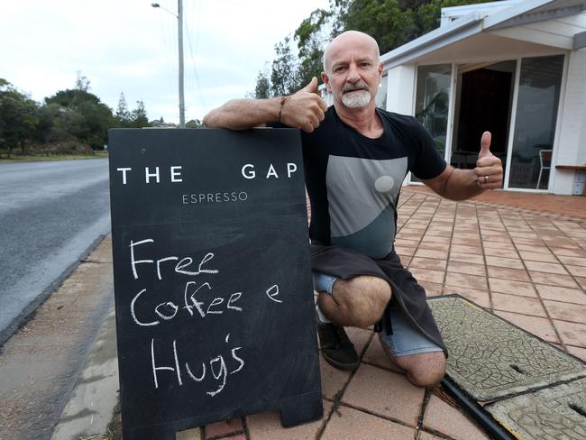 Tathra coffee shop owner Mark Whitbread is giving away free coffee and hugs. Picture: Gary Ramage